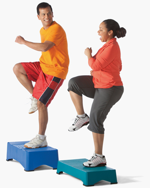 woman and man doing step aerobics